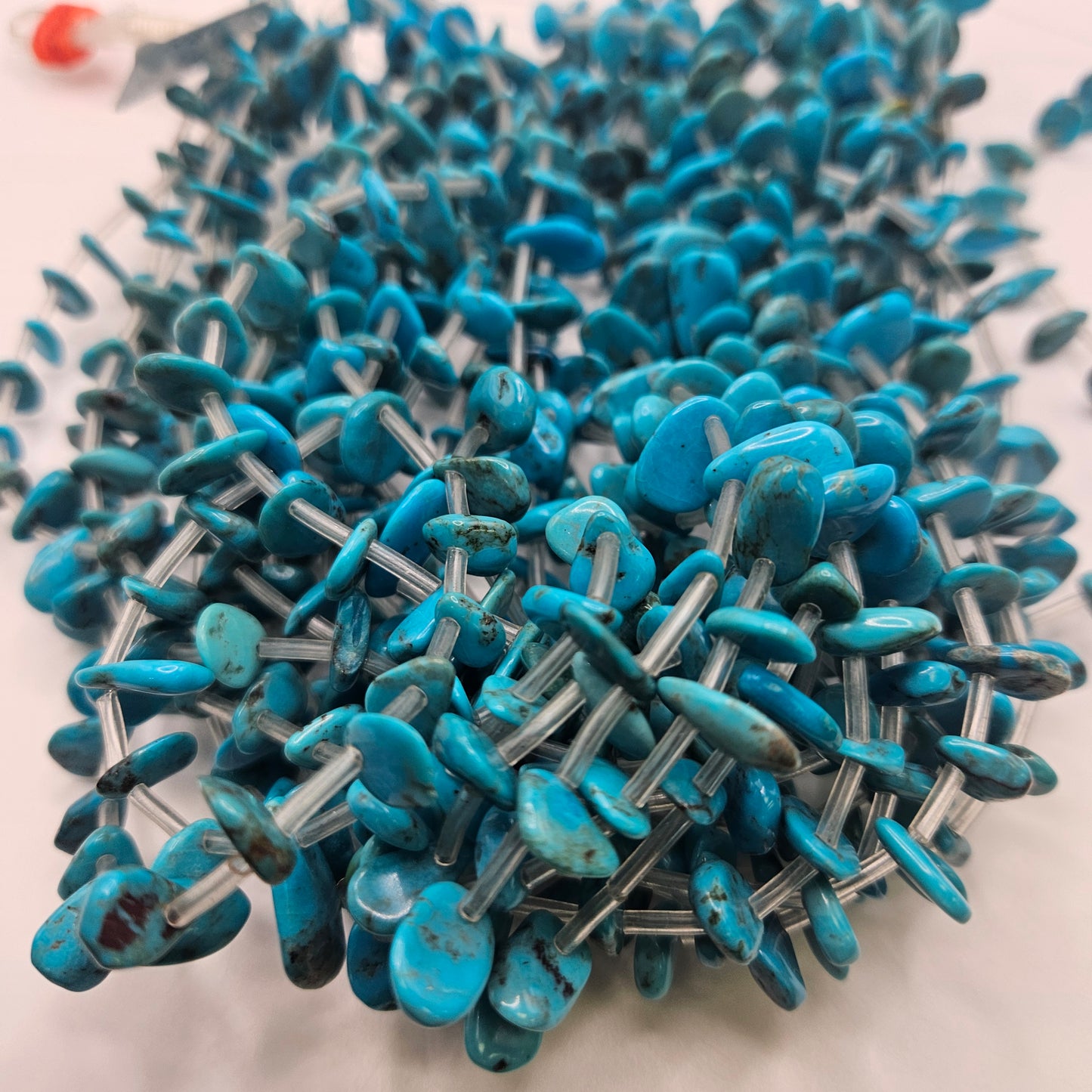 6 to 8mm Turquoise Side Drill Teardrop Bead Strand.