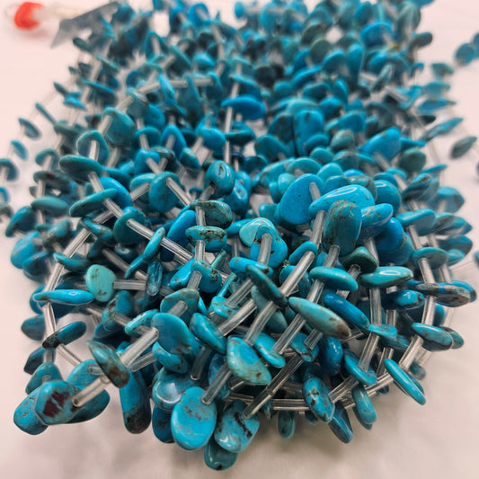 6 to 8mm Turquoise Side Drill Teardrop Bead Strand.