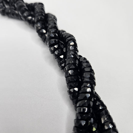 6mm Black Spinel Faceted Coin Strand.