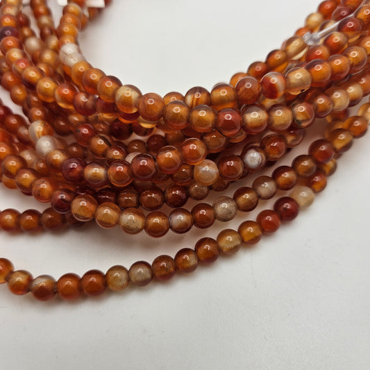 6mm Carnelian Large Hole Round Bead Strand.