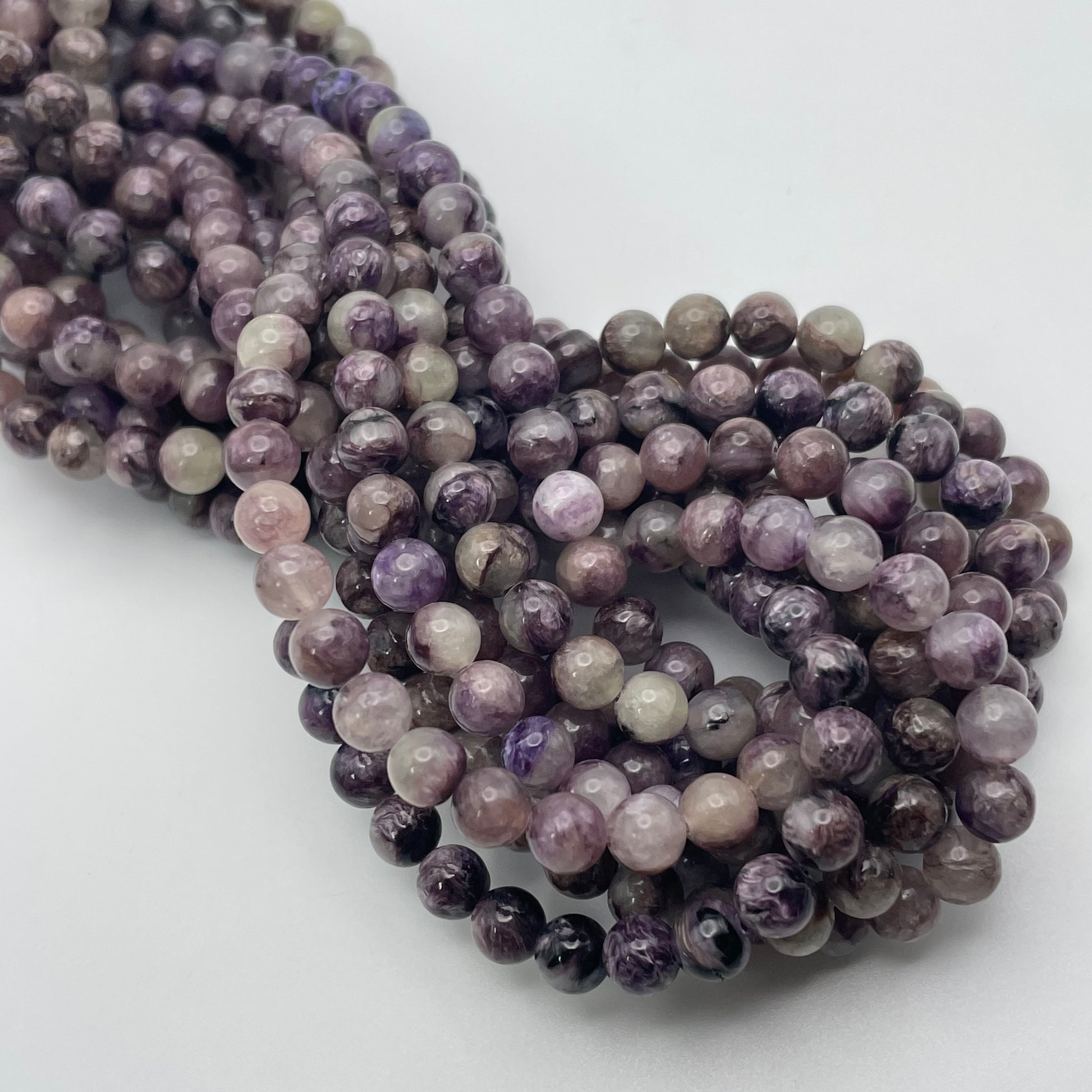 6mm Charoite Round Smooth Bead Strand.