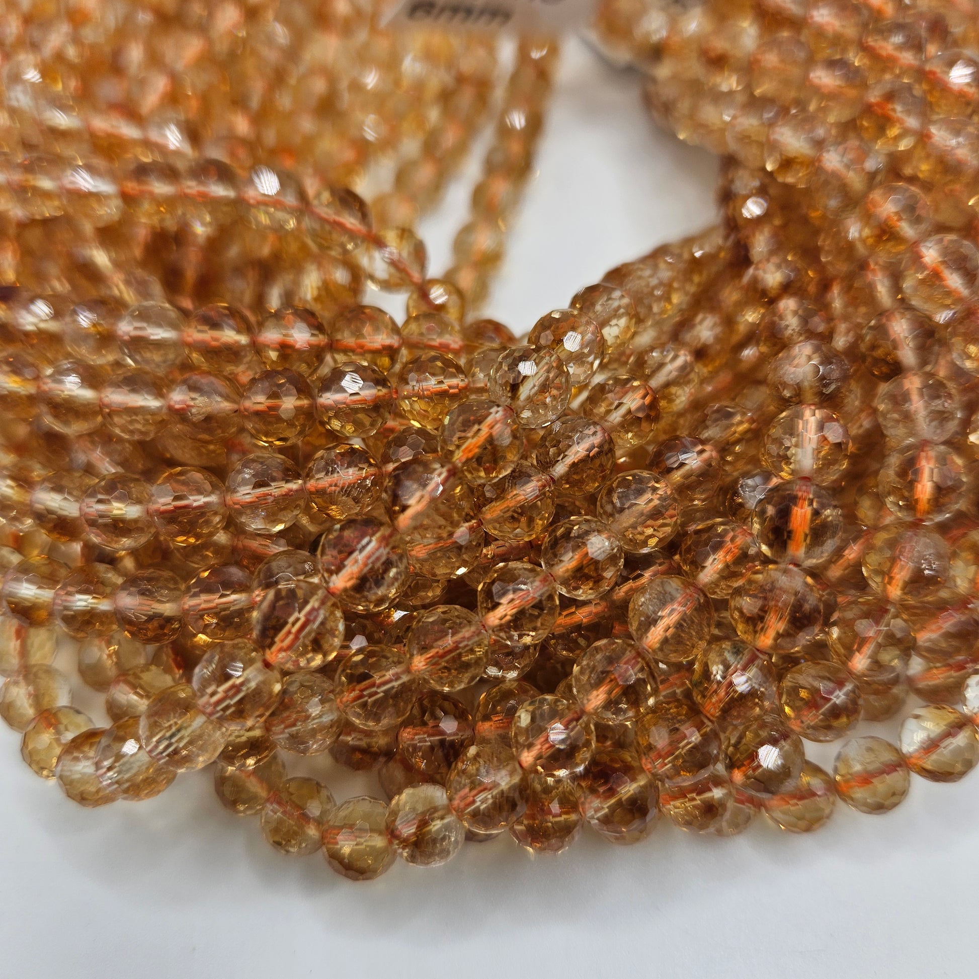 6mm Citrine Faceted Round Beads.