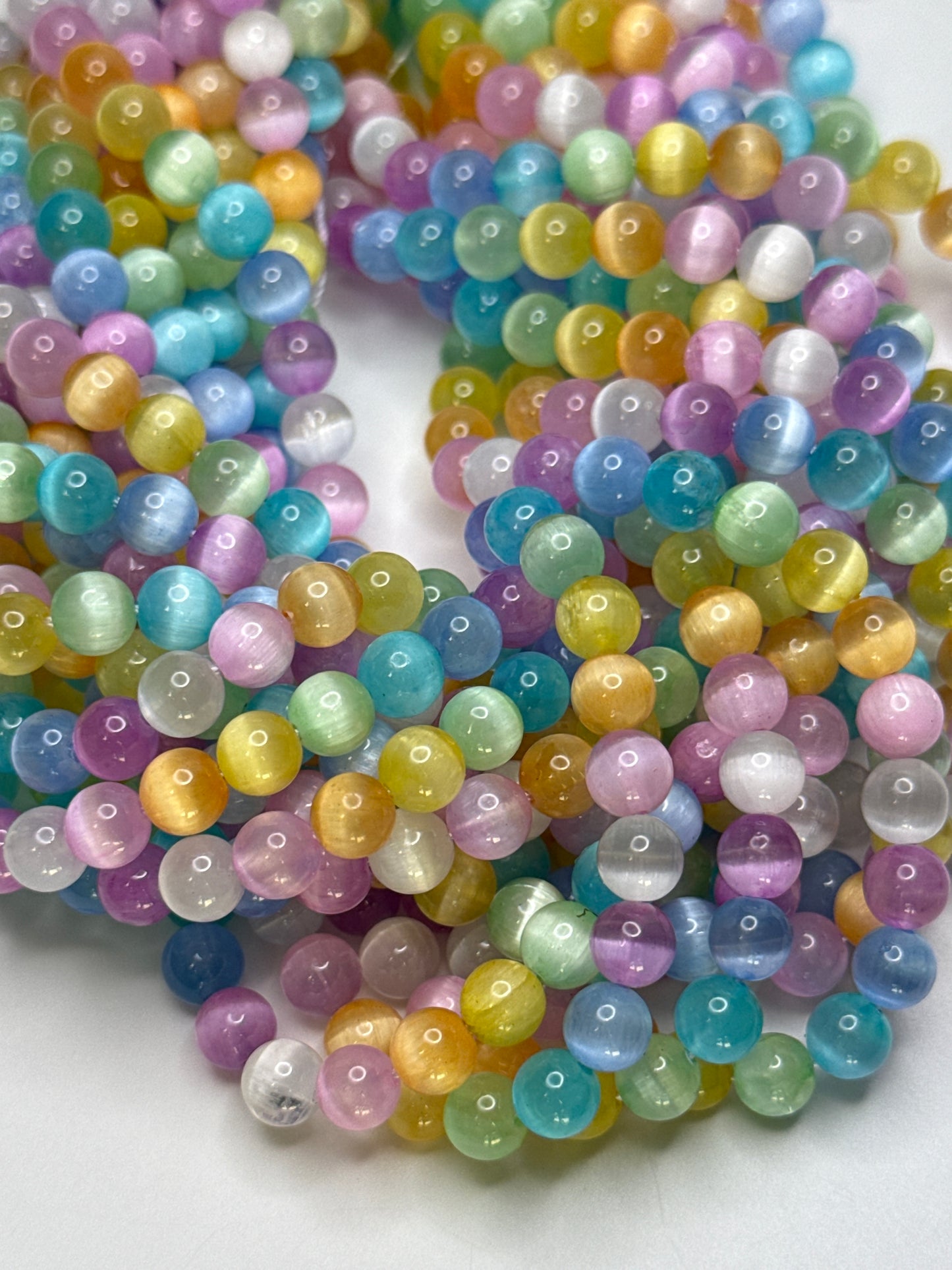 6mm Dyed Selenite Candy Smooth Round.