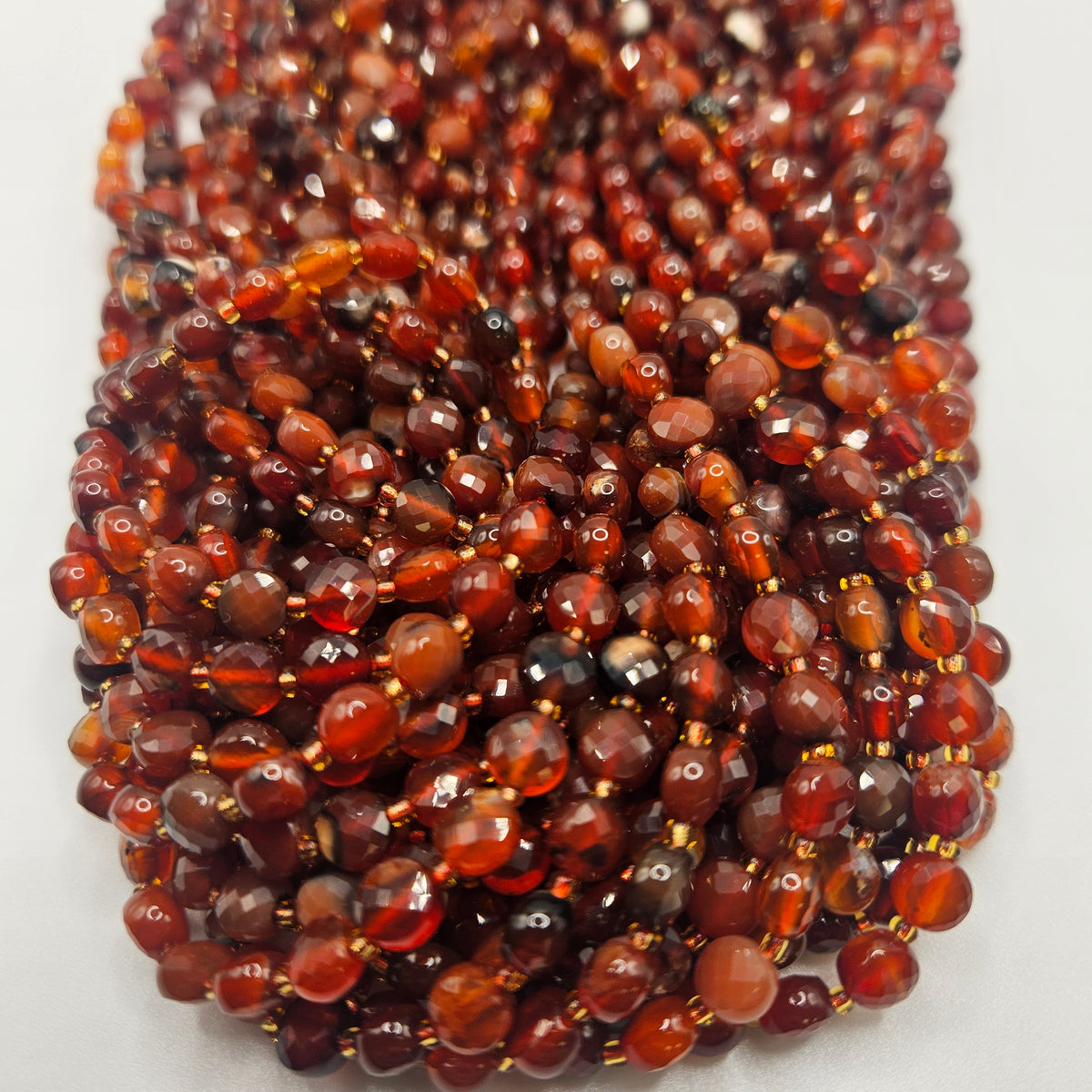 6mm Faceted Carnelian Coin Bead Strand.