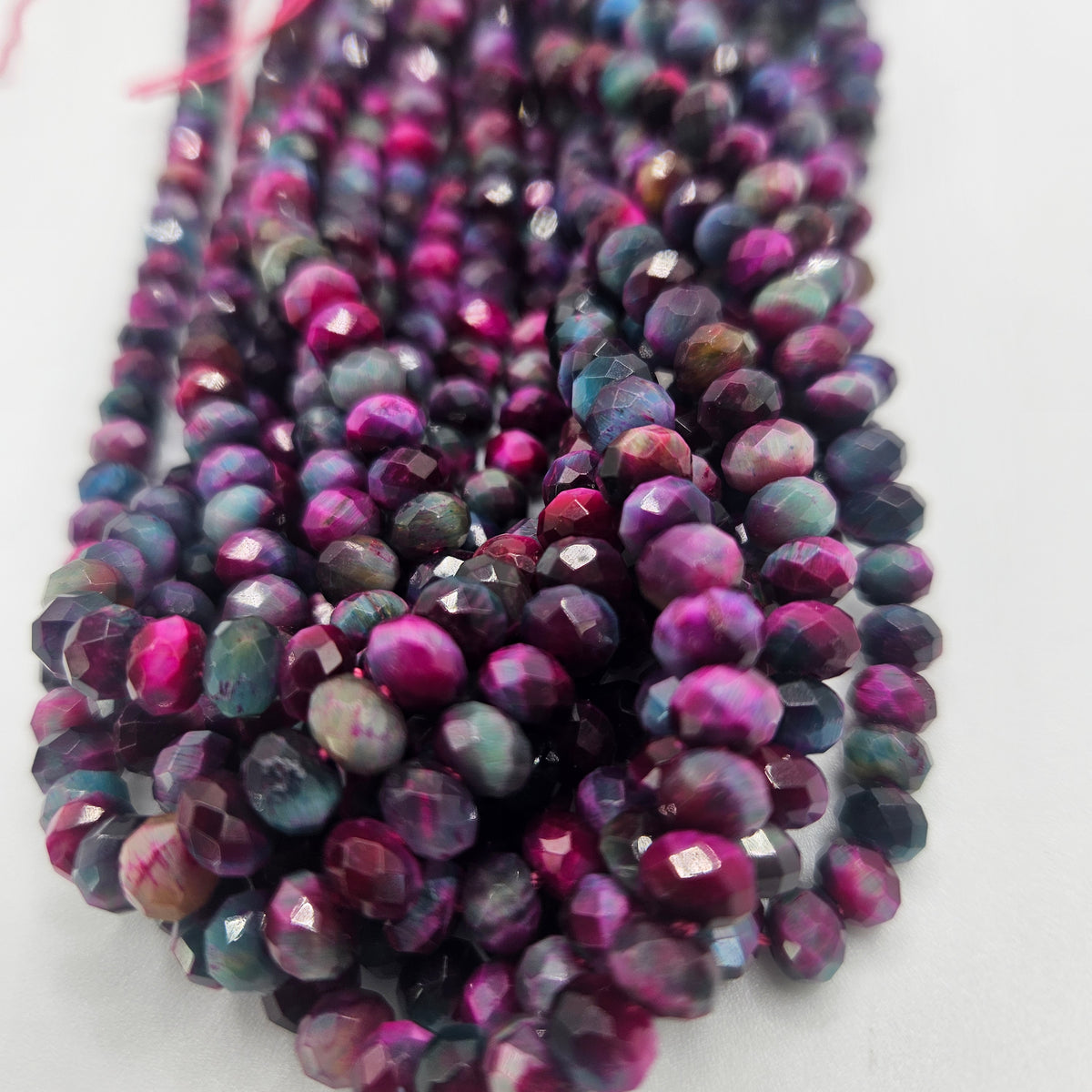 6mm Faceted Dyed Pink Tiger Eye Bead Strand.