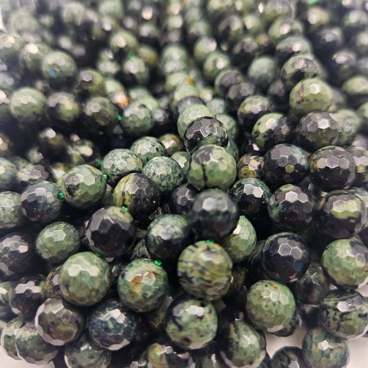 6mm Faceted Kambaba Jasper Round Bead Strand.