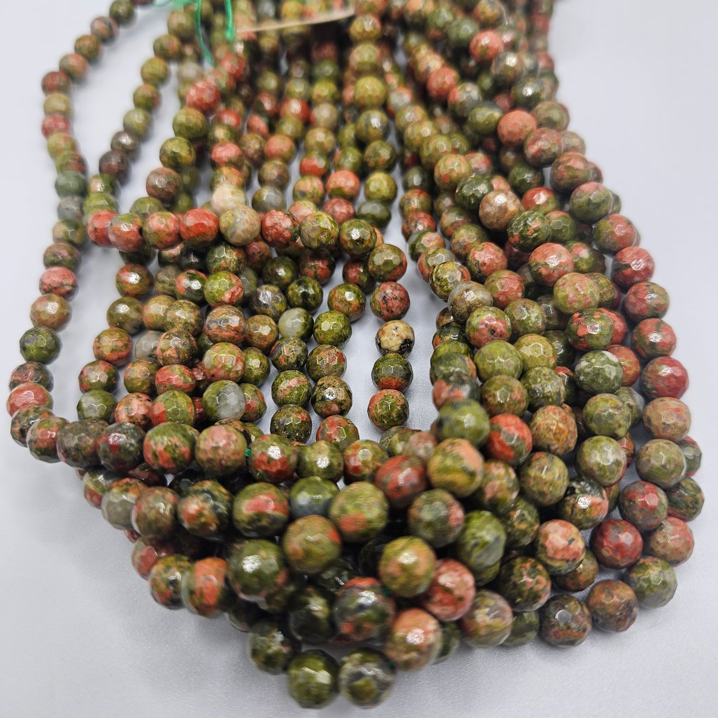 6mm Faceted Unakite Jasper Round Bead Strand.