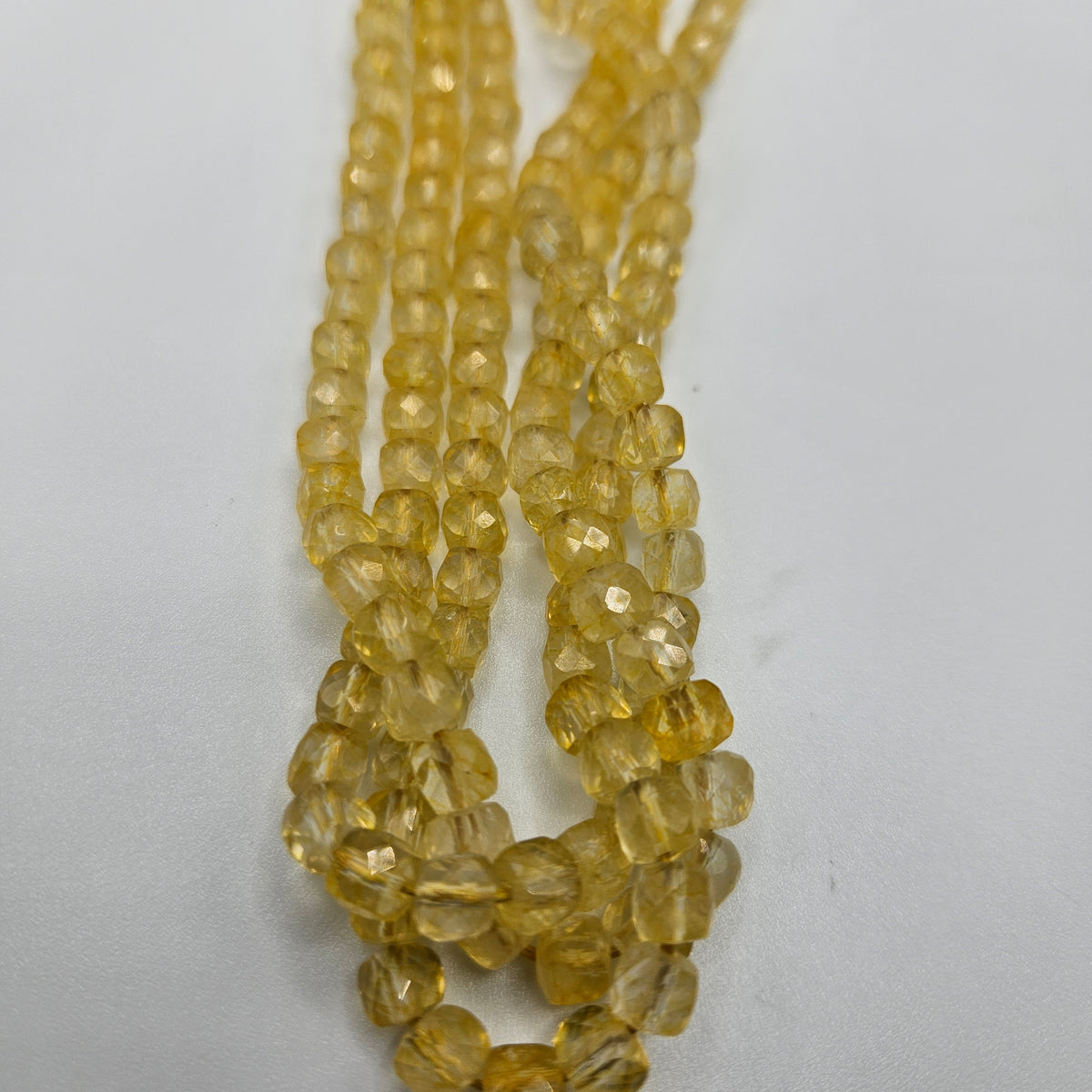 6mm Faceted Yellow Topaz Cube Bead Strand.