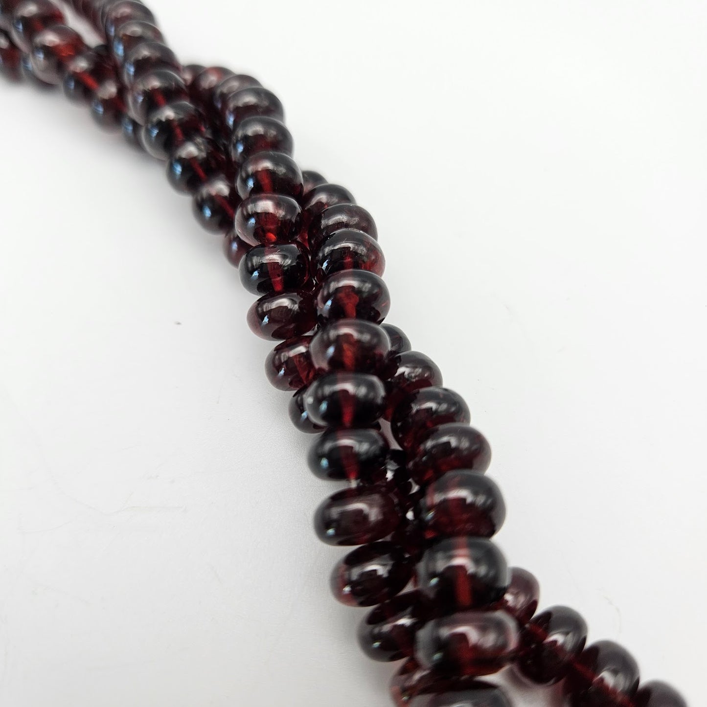 6mm Garnet Saucer Bead Strand.