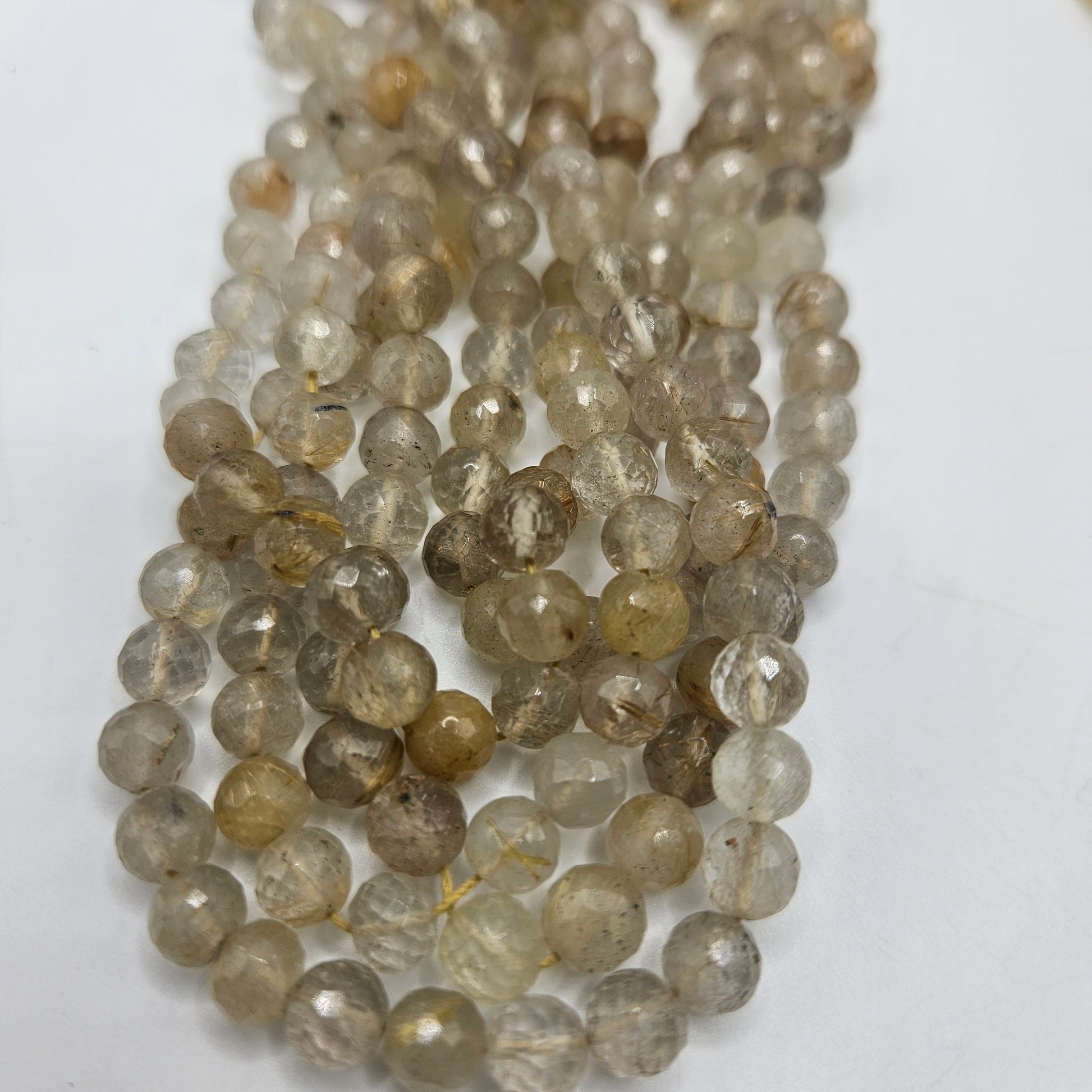 6mm Gold Rutilated Quartz Faceted Round Bead Strand.