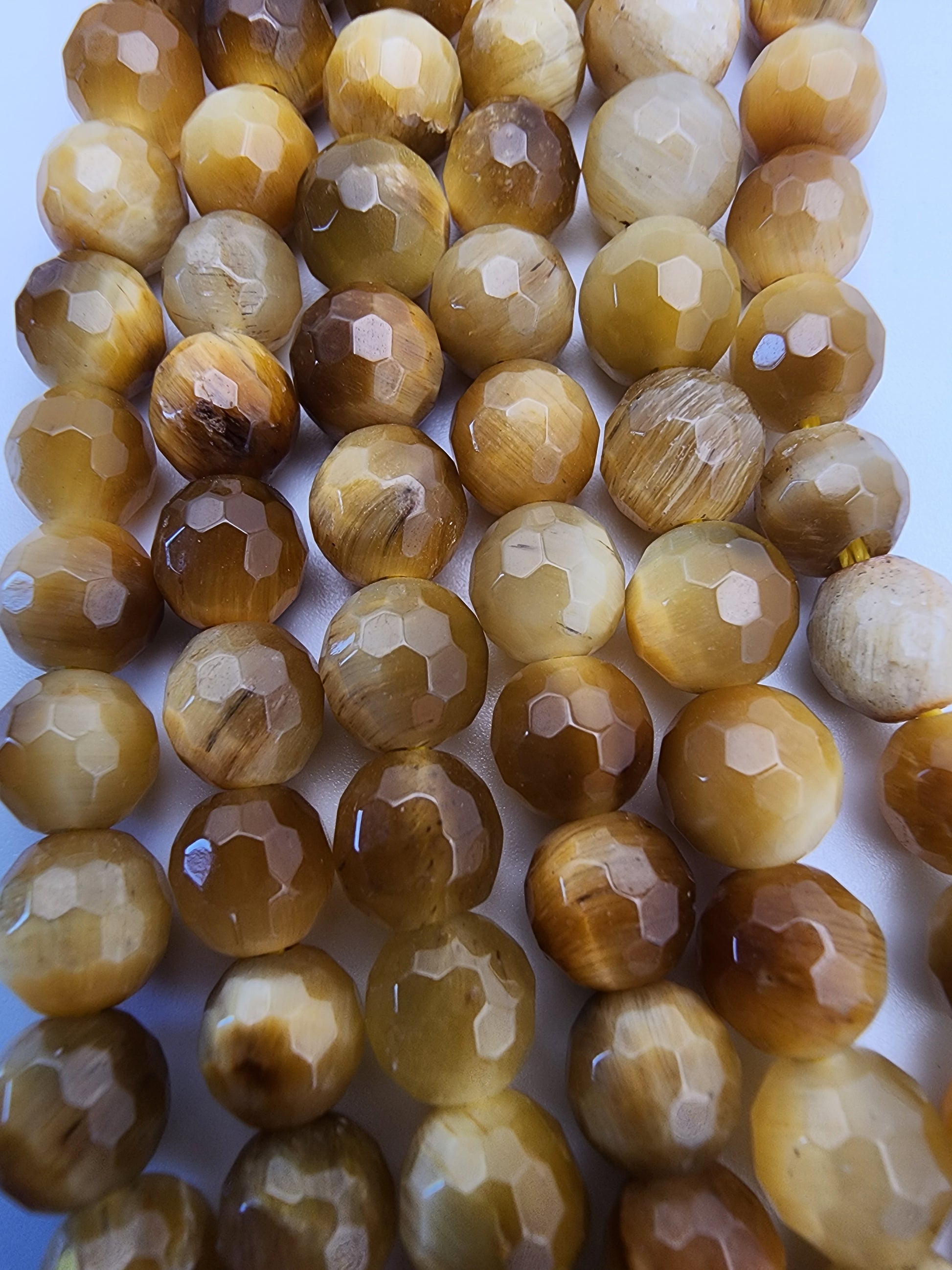6mm Golden Tiger's Eye Faceted Bead Strand.