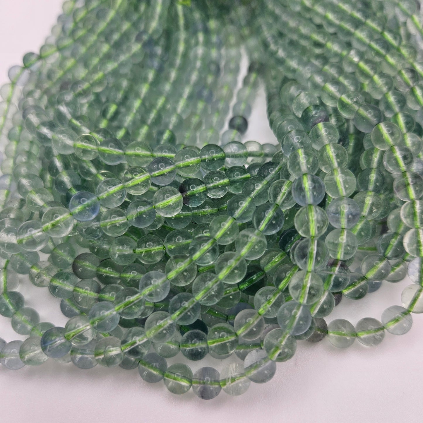 6mm Green Fluorite Bead Strand.
