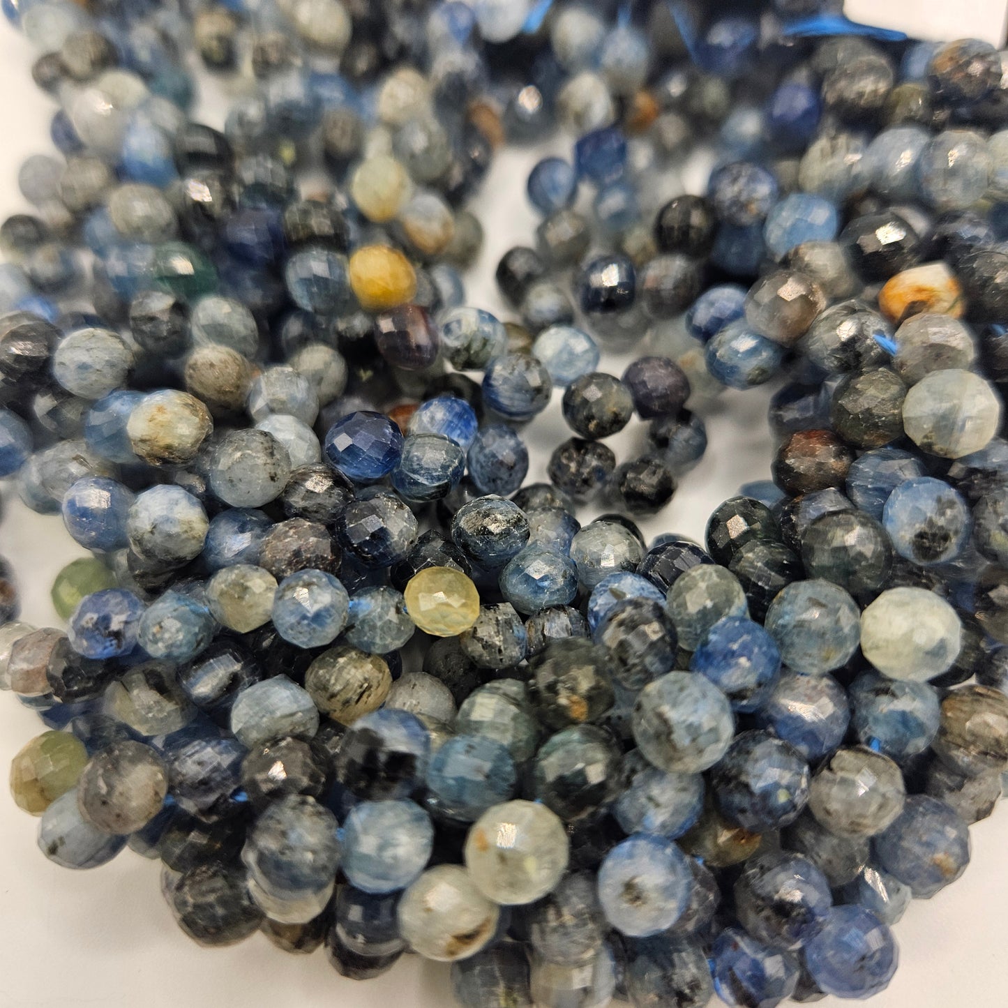 6mm Kyanite Faceted Top Drill Bead Strand.