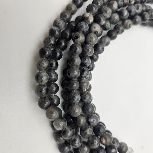 6mm Larkavite Large Hole Round Bead Strand.