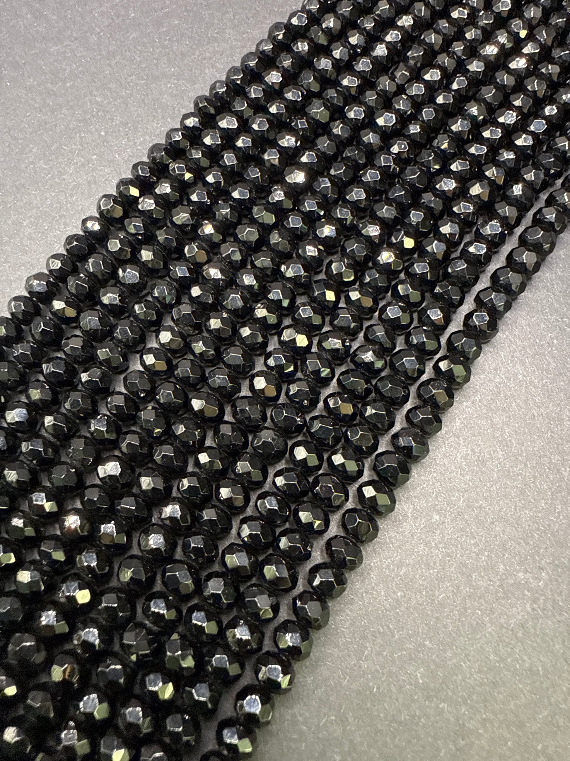 6mm Onyx Faceted Rondell.