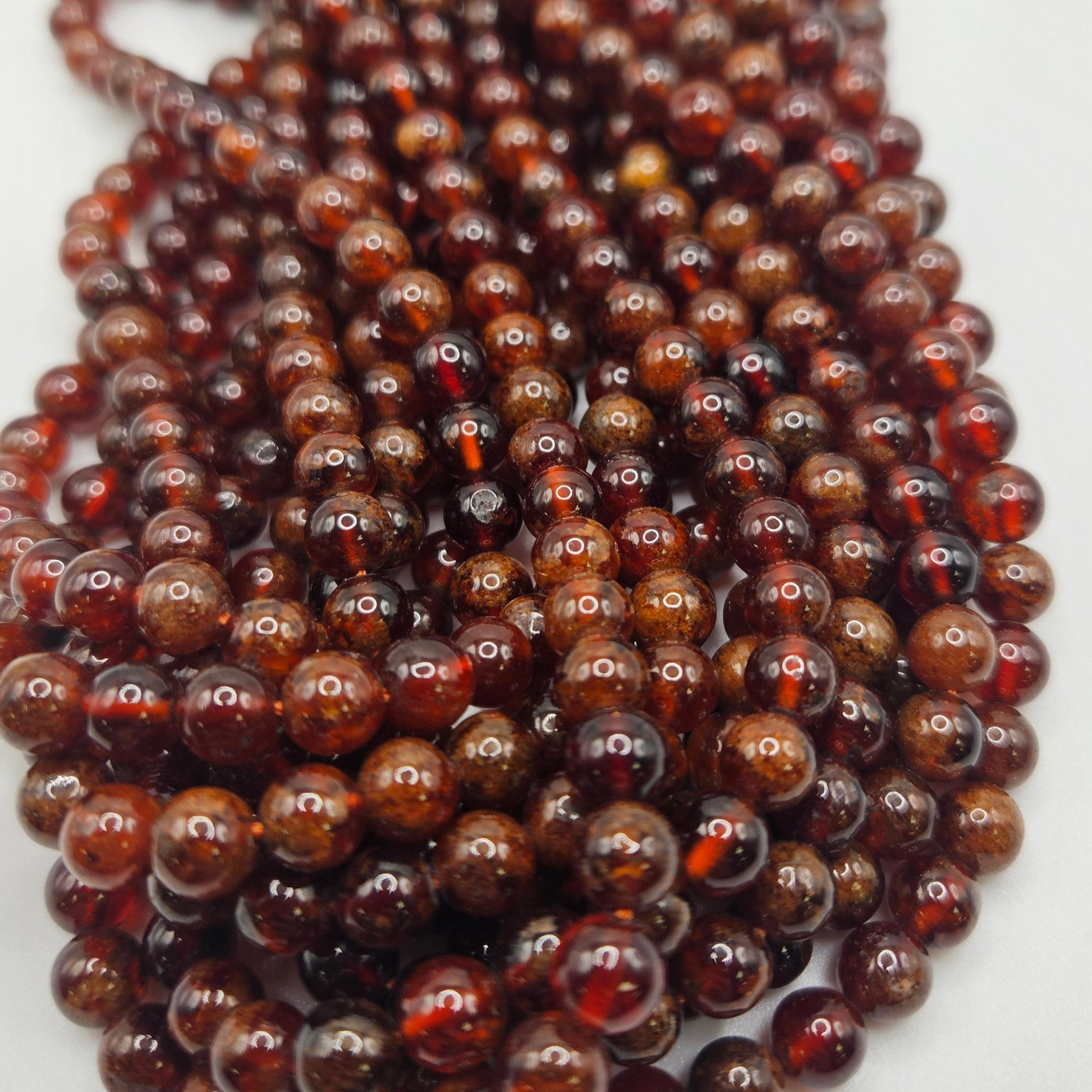 6mm Orange Garnet Bead Strand.