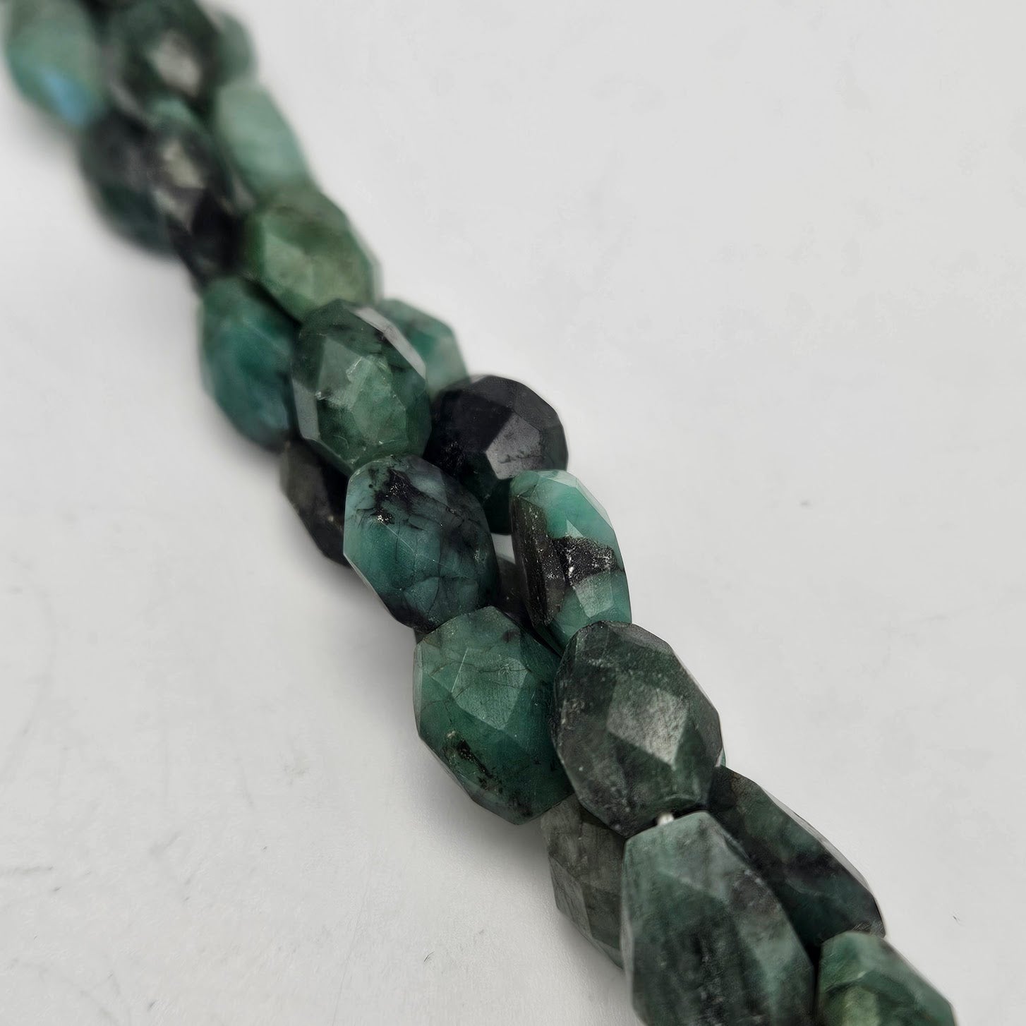 6mm Oval Emerald Faceted Bead Strand.