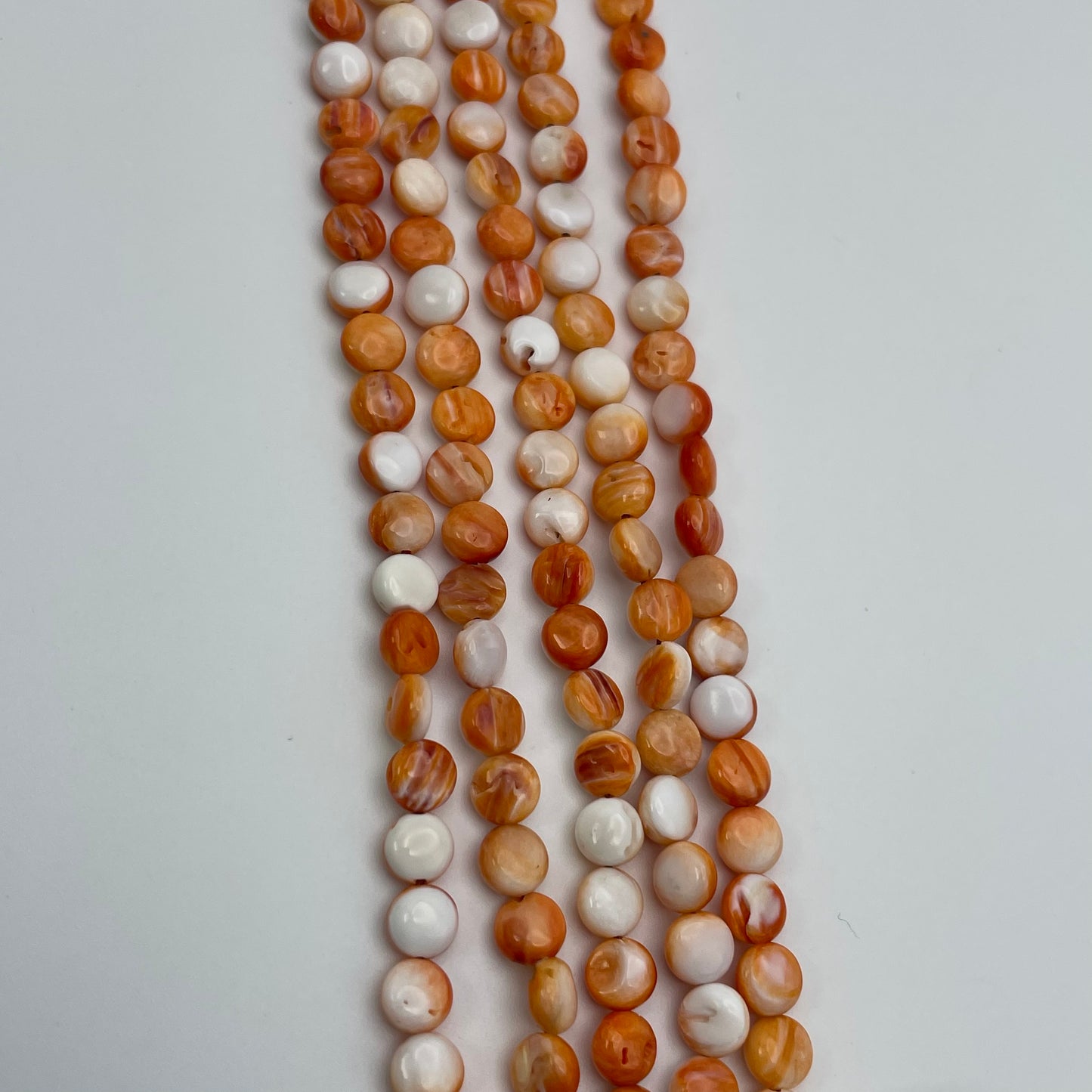 6mm Spiny Oyster Coin Bead Strand.