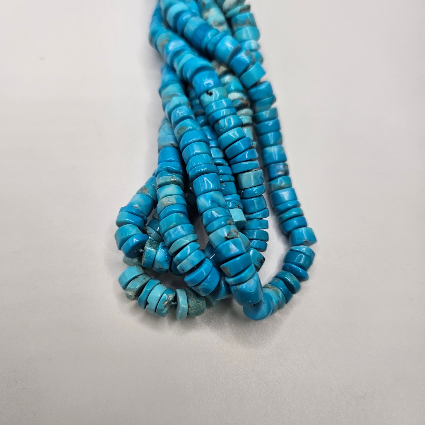 6mm Turquoise Disc Strand.