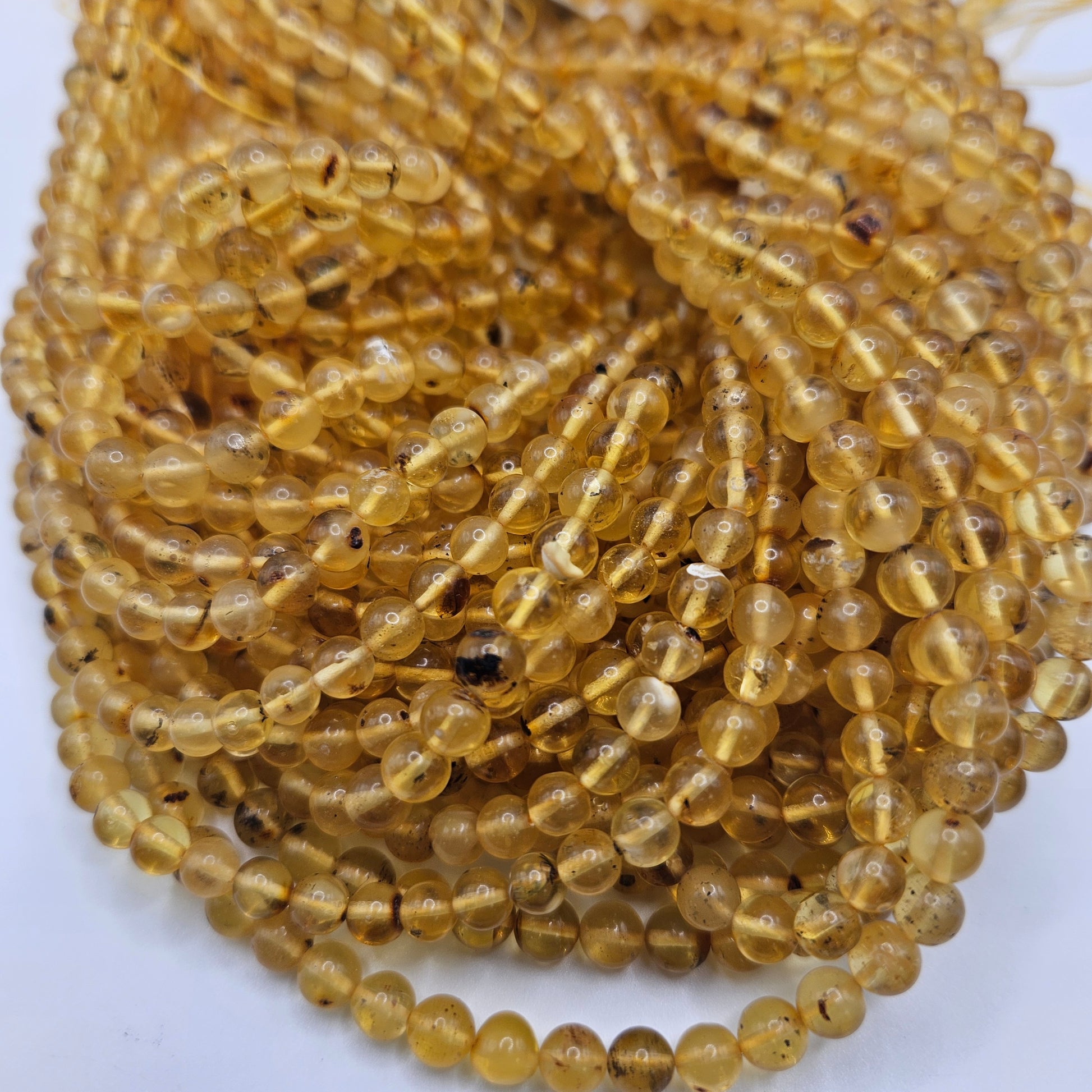 6mm Yellow Amber Clear Round Bead Strand.