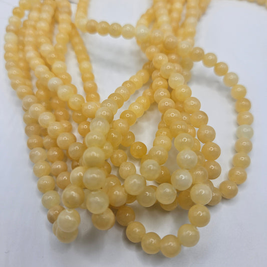 6mm Yellow Calcite Round Bead Strand.