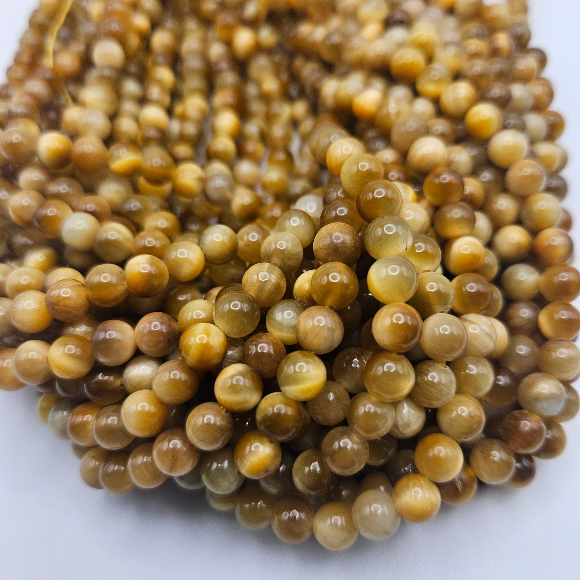 6mm Yellow Tiger's Eye Round Bead Strand.
