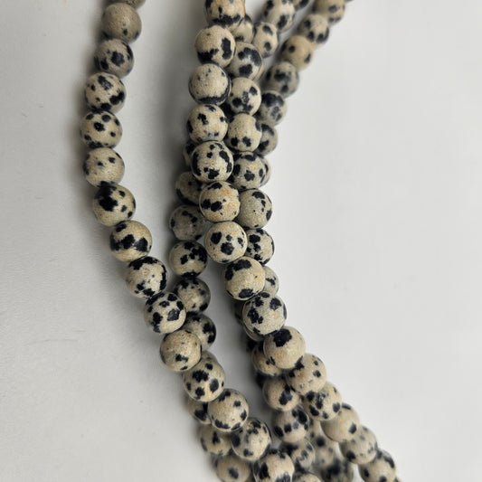 6mm Dalmatian Jasper Large Hole Round Bead Strand.
