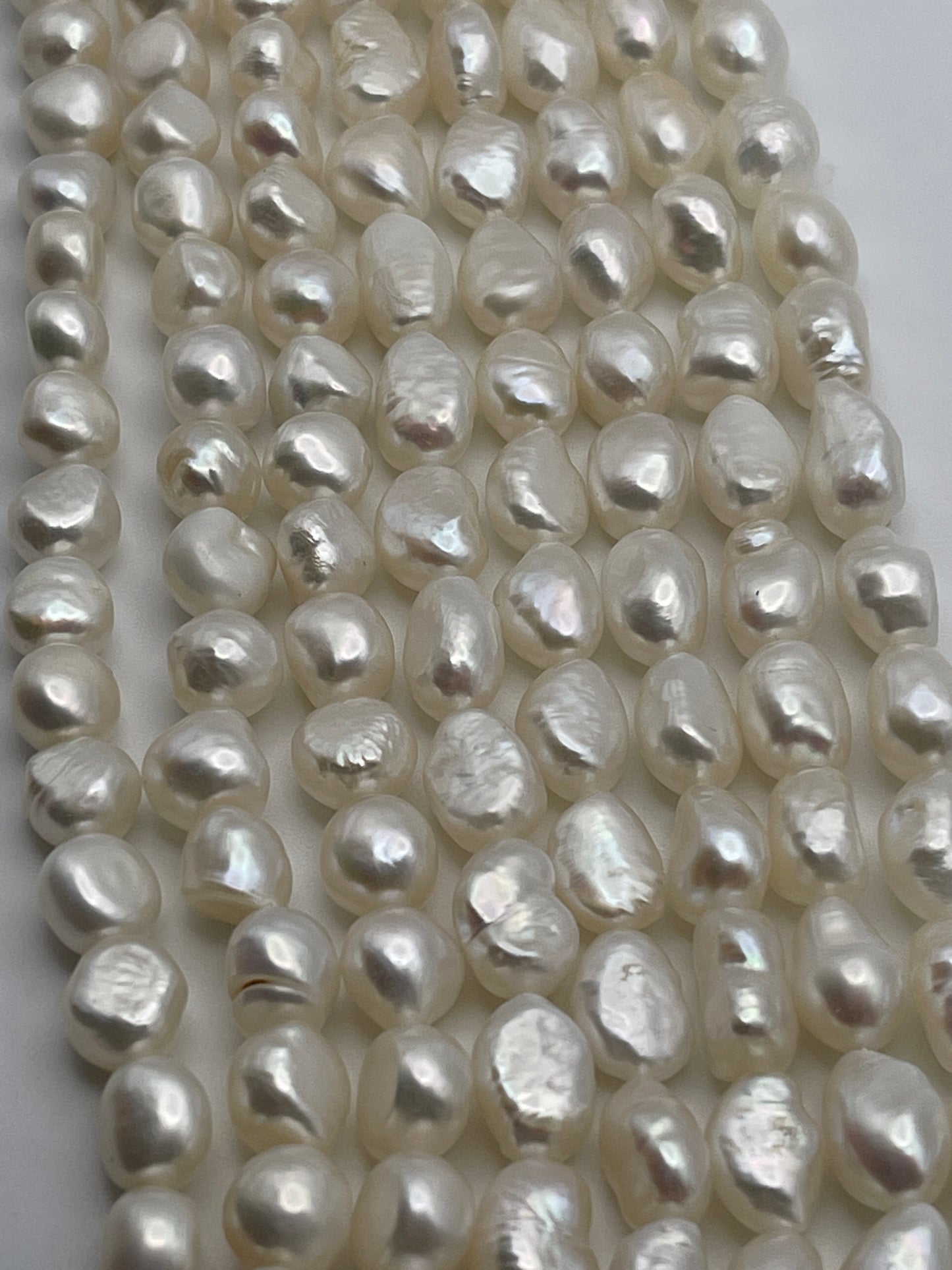 7-8mm White Flat pearl Bead Strand.