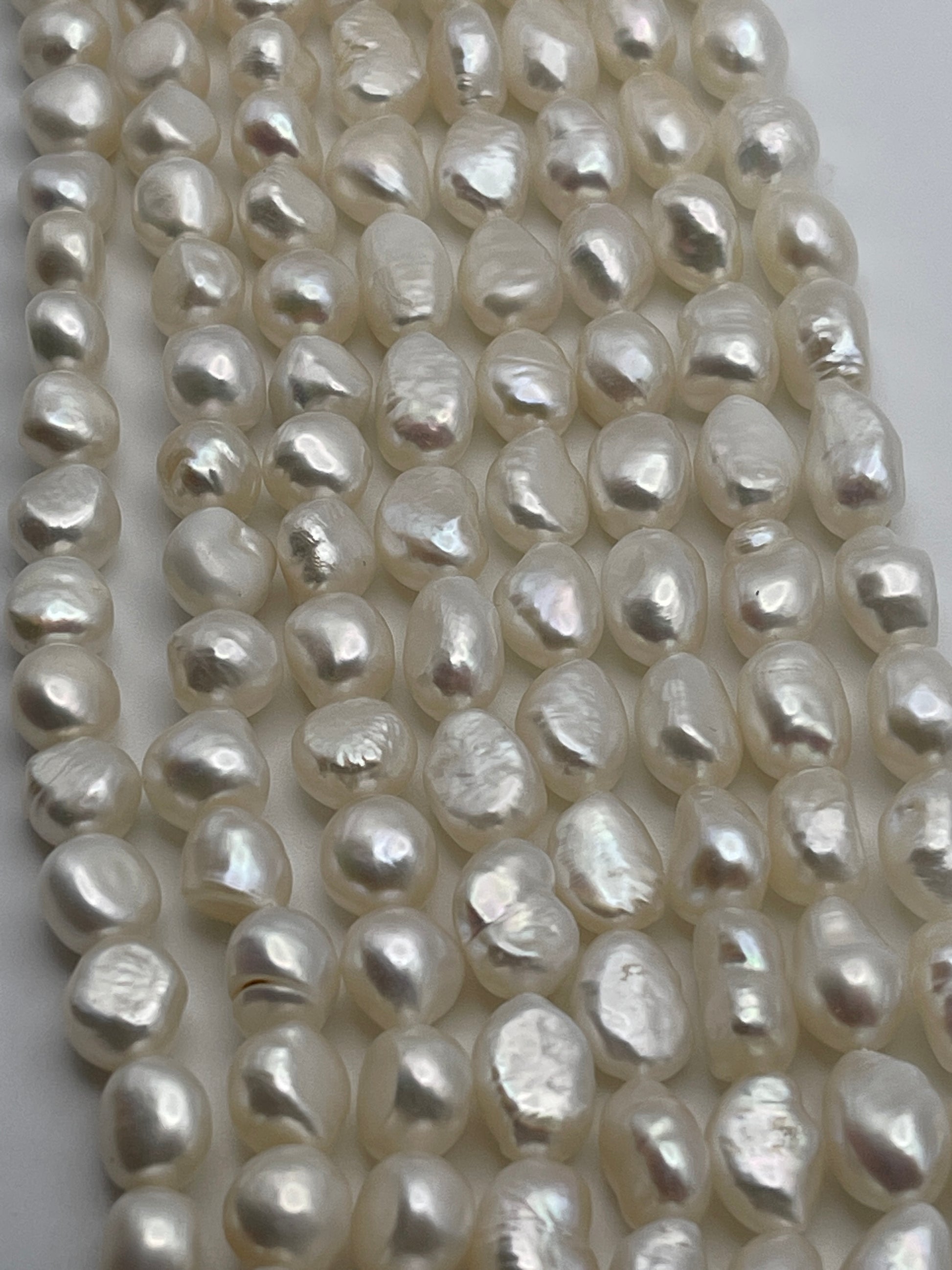 7-8mm White Flat pearl Bead Strand.