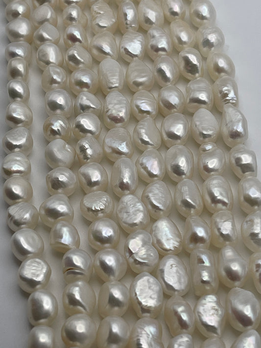 7-8mm White Flat pearl Bead Strand.