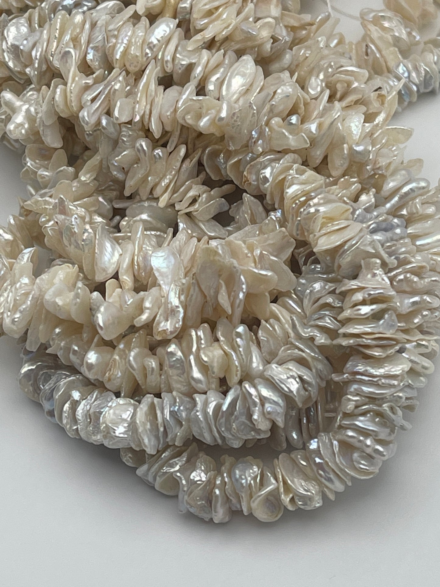 7-9/11-14mm Keshi White Center Drill Pearl.