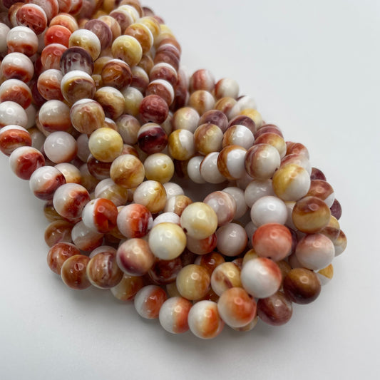 7mm Spiny Oyster Assorted Smooth Round Bead Strand.