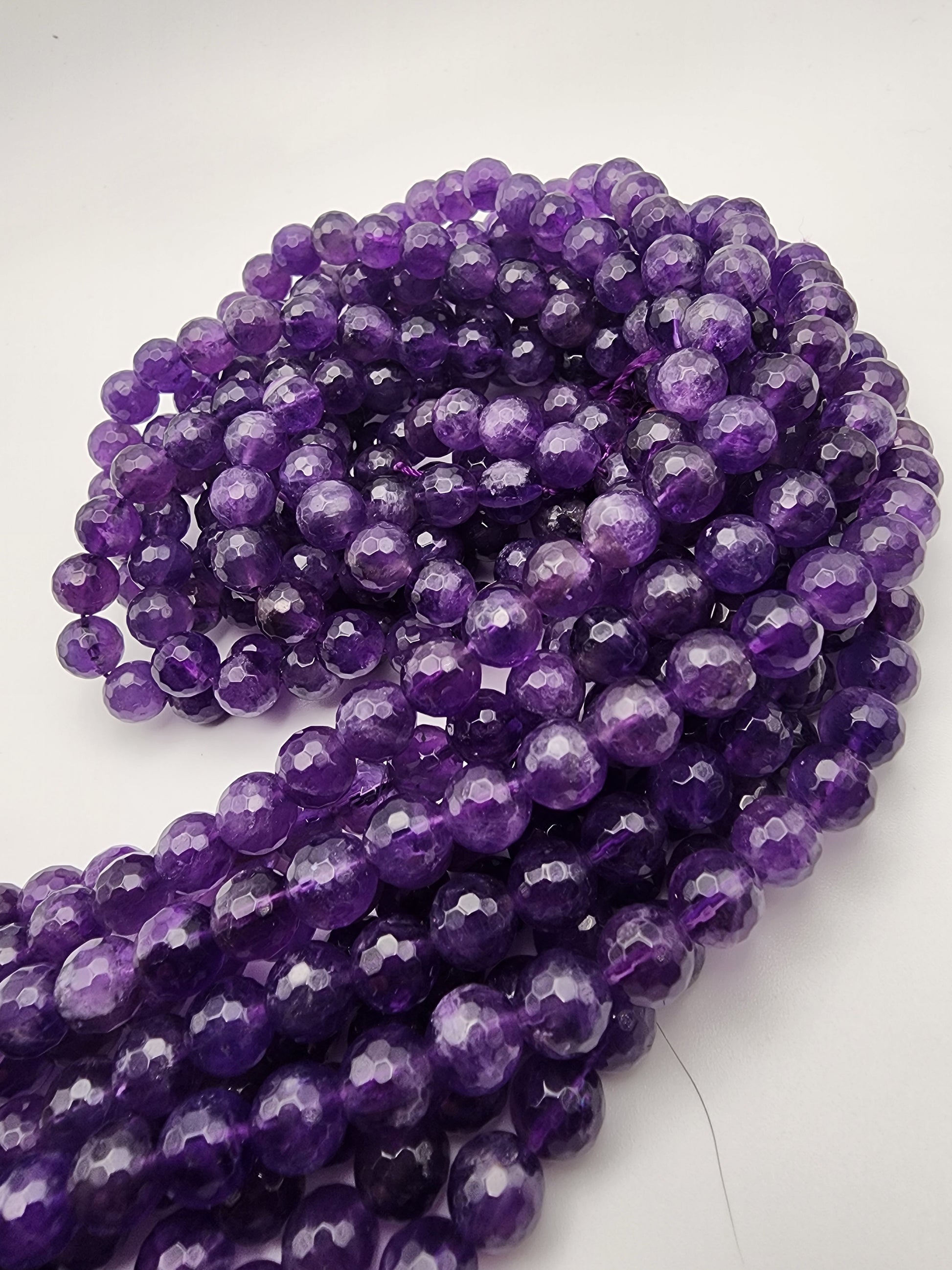 8mm Amethyst Faceted Bead Strand.
