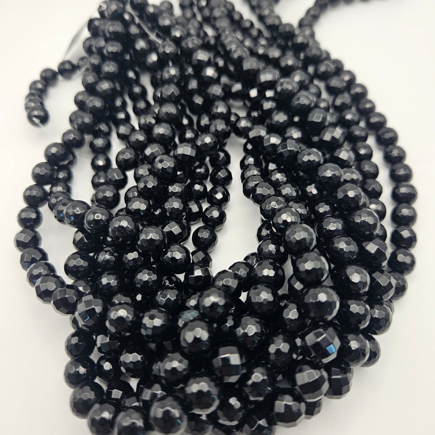 8mm Black Onyx Faceted Bead Strand.