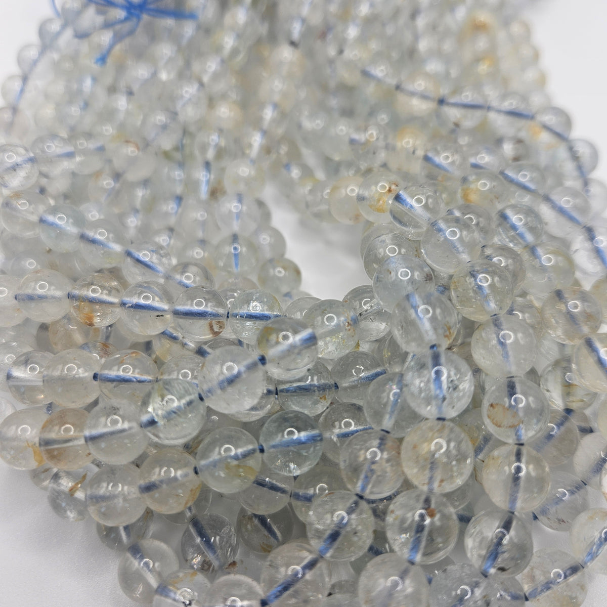 8mm Blue Topaz Bead Strand.