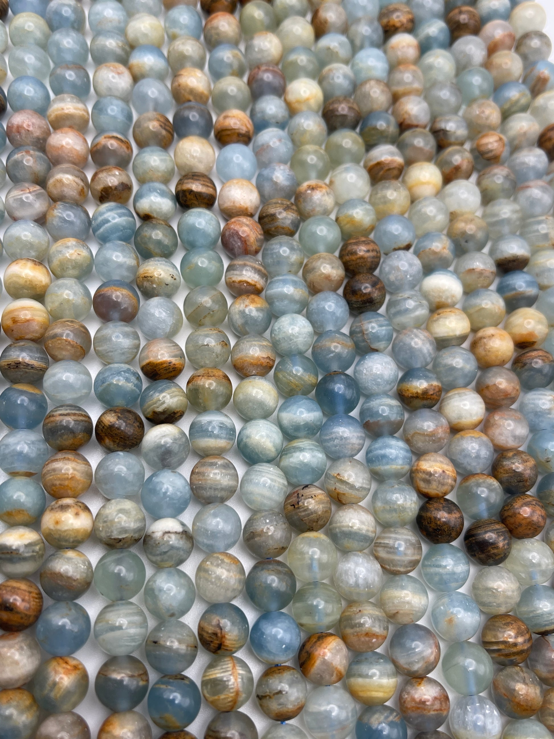 8mm Calcite Aquatine Round Smooth Bead Strand.