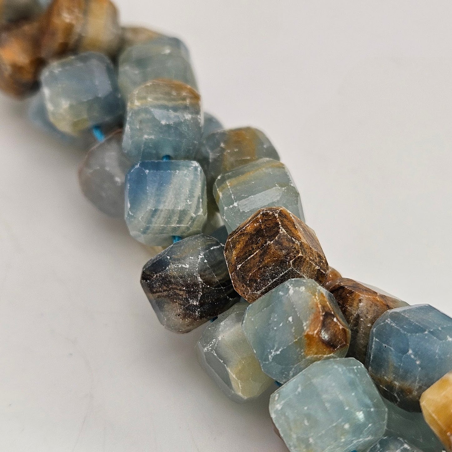 8mm Cubed Faceted Blue Calcite Strand.