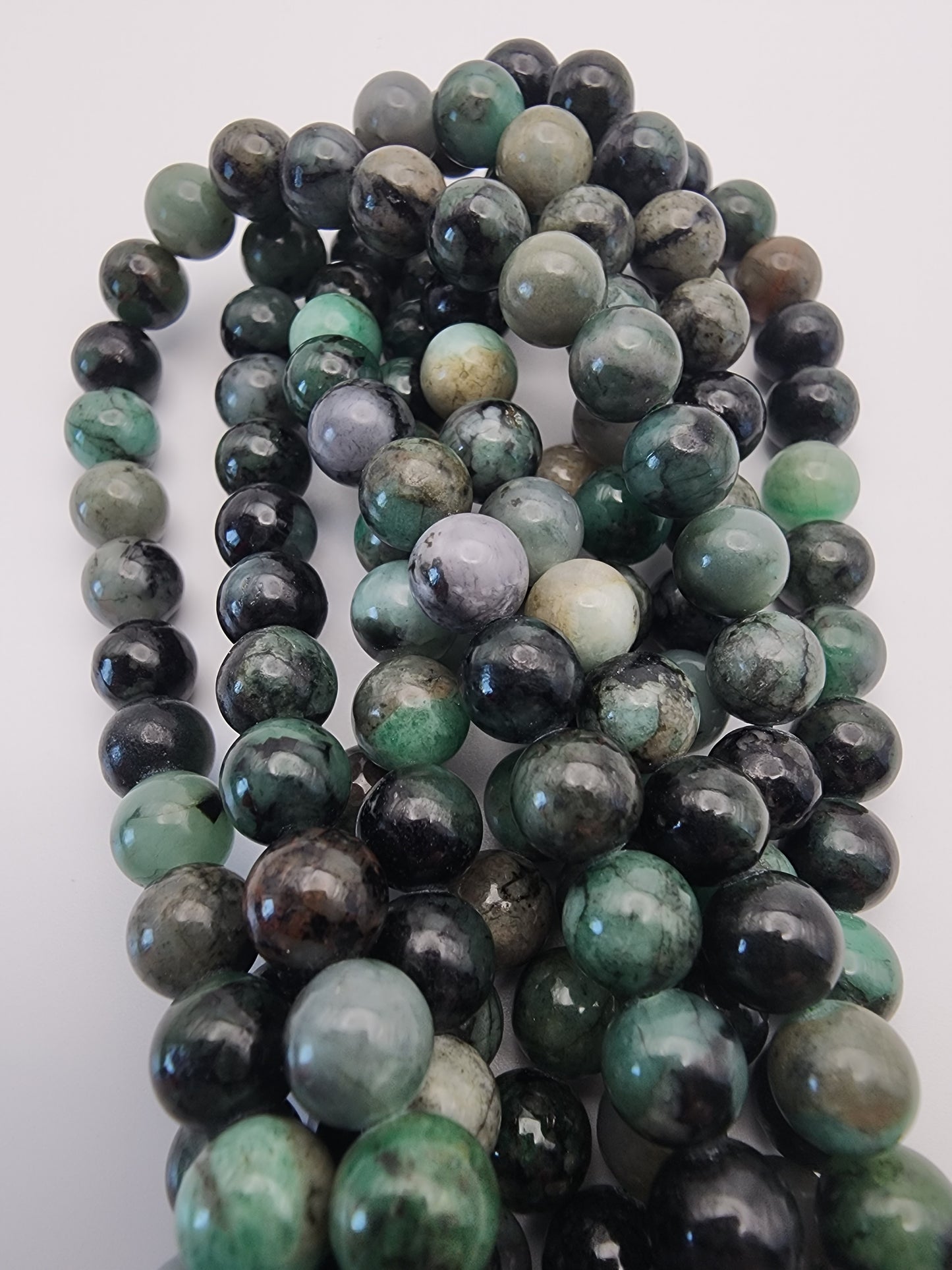 8mm Emerald Round Bead Strand.
