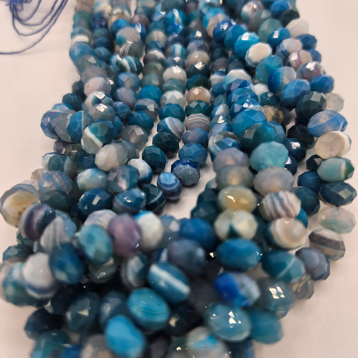 8mm Faceted Dyed Blue Agate Bead Strand.
