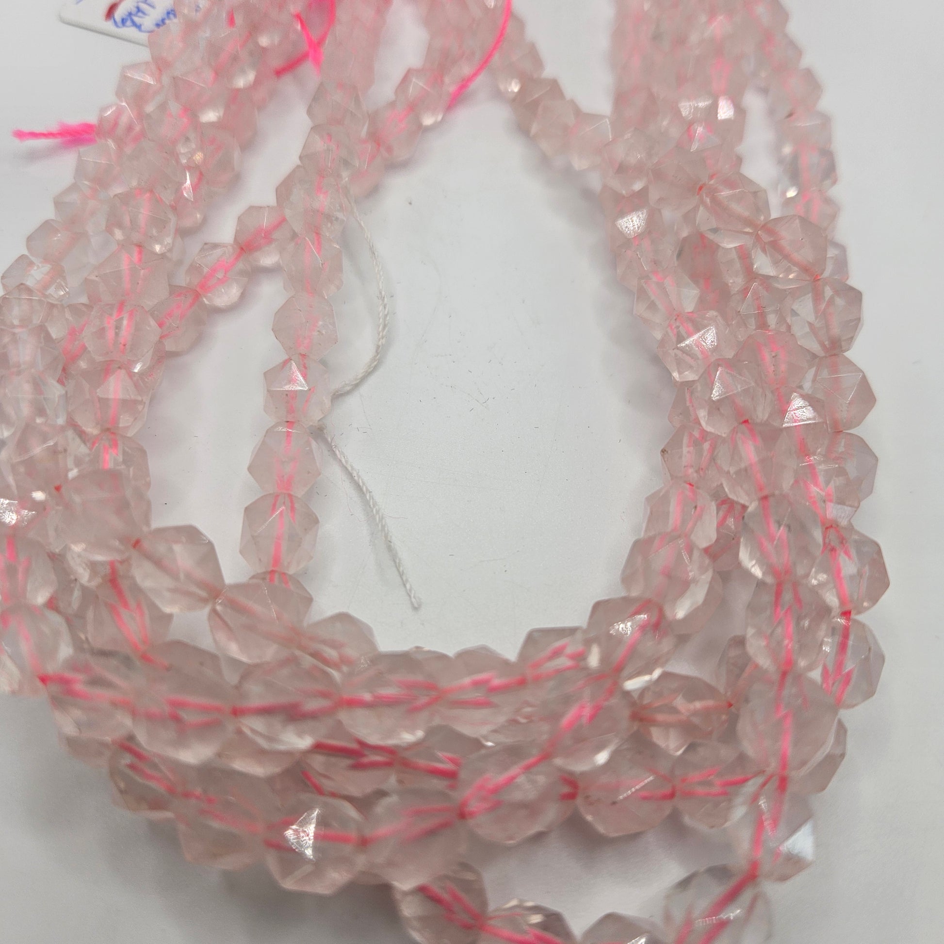 8mm faceted rose quartz bead strand.