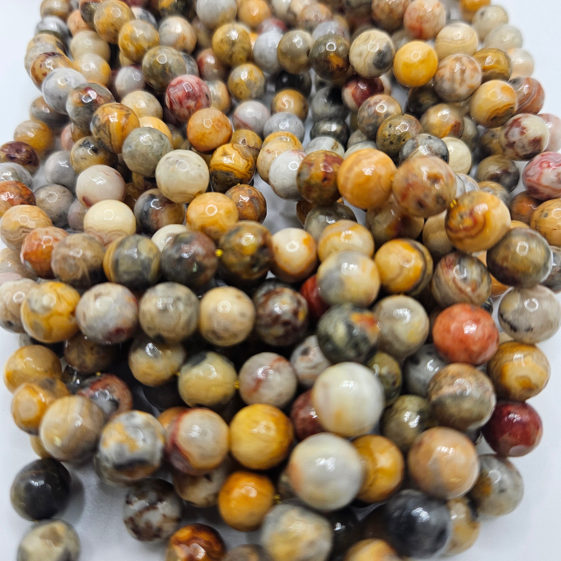 8mm Faceted Yellow Crazy Lace Bead Strand. 