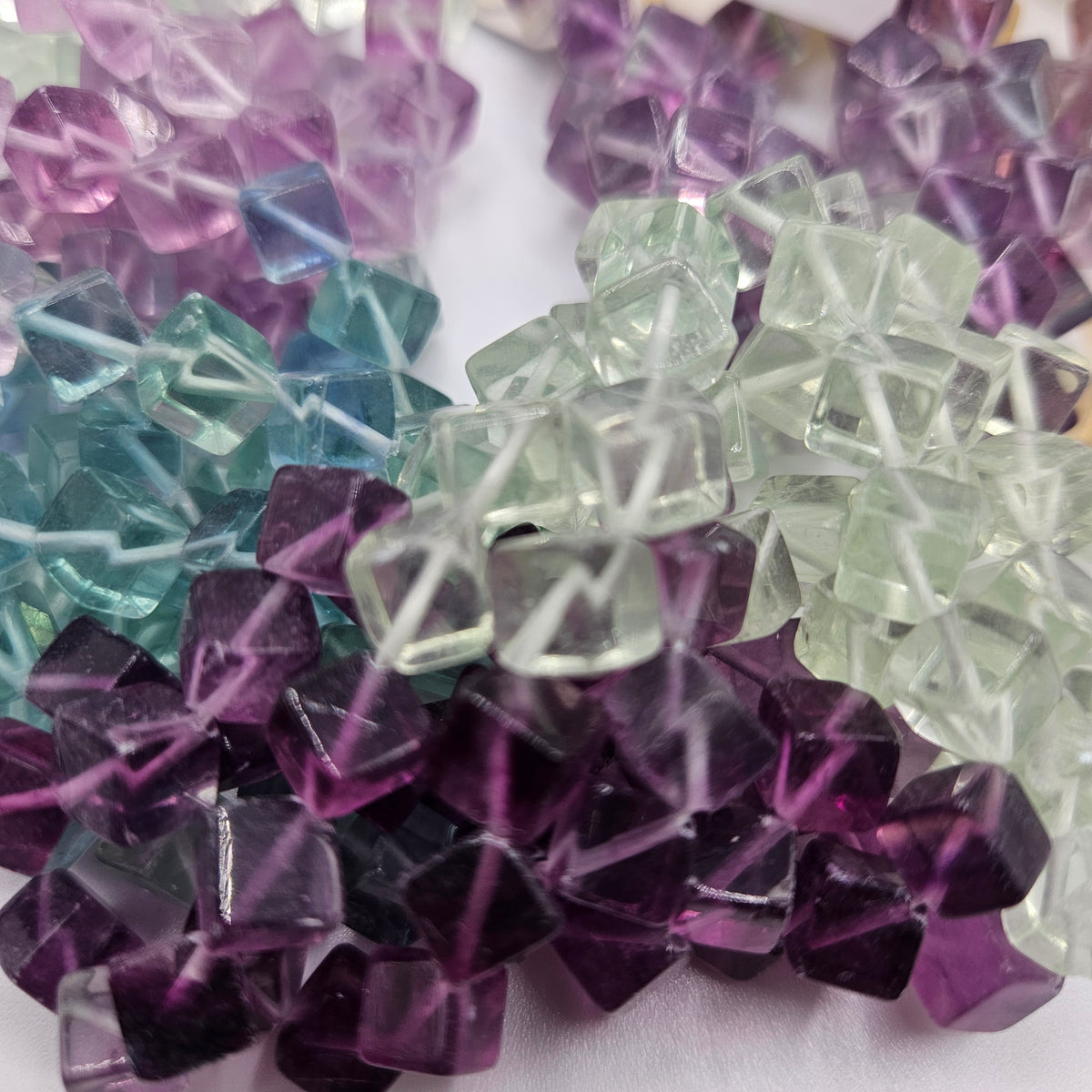 8mm Fluorite Diagonal Cube Bead Strand.