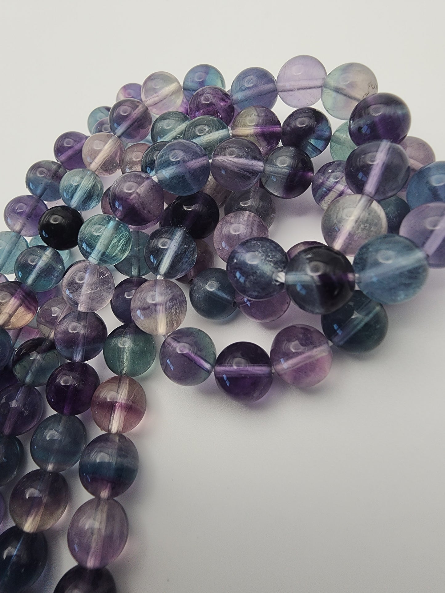 8mm Fluorite Round Bead Strand.