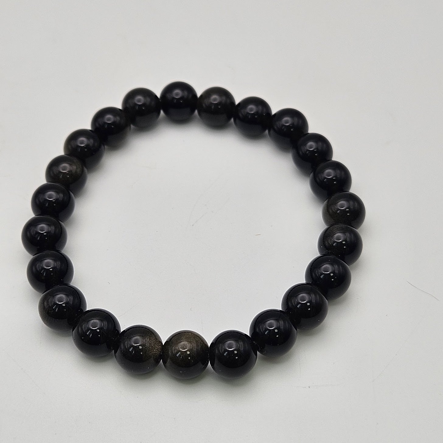 8mm Gold Obsidian Stretch Bracelet.