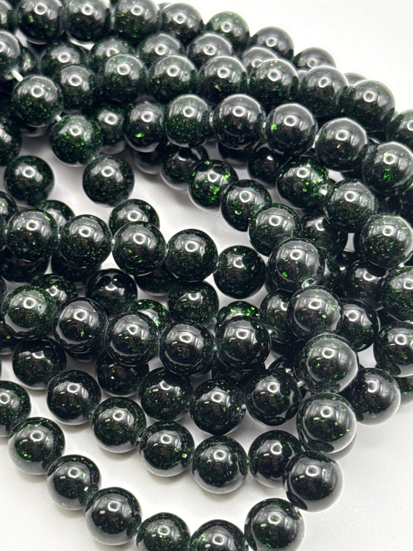 8mm Green Goldstone Round Beads.