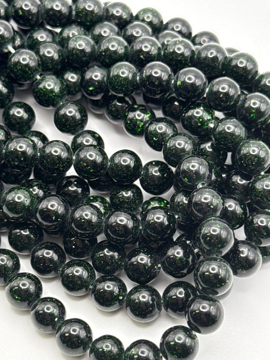 8mm Green Goldstone Round Beads.
