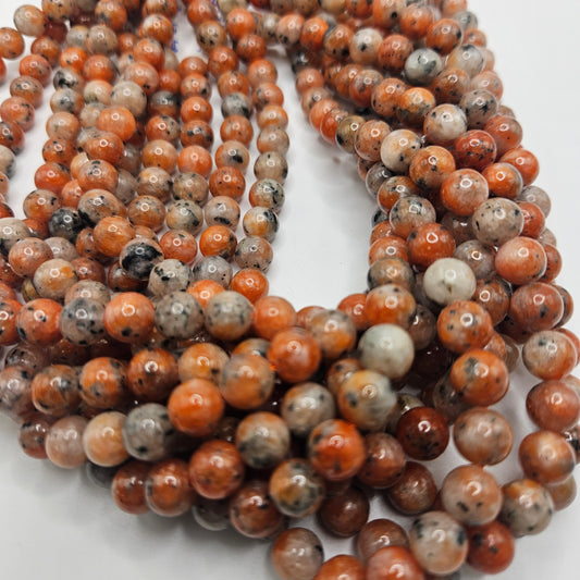 8mm Orange Calcite Round Bead Strand.