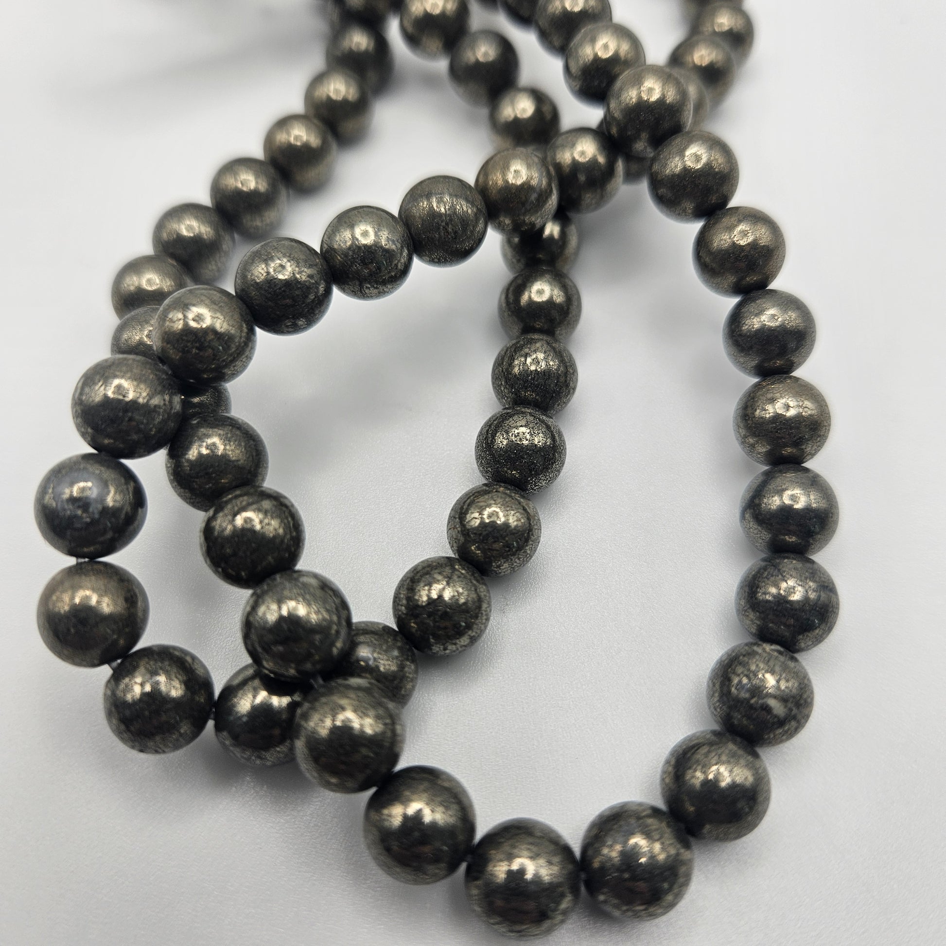 8mm Pyrite Round Bead Strand.