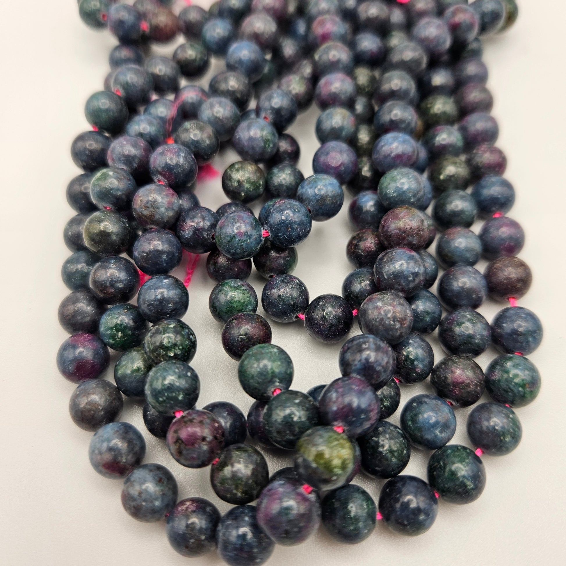 8mm Ruby Kyanite Round Bead Strand.