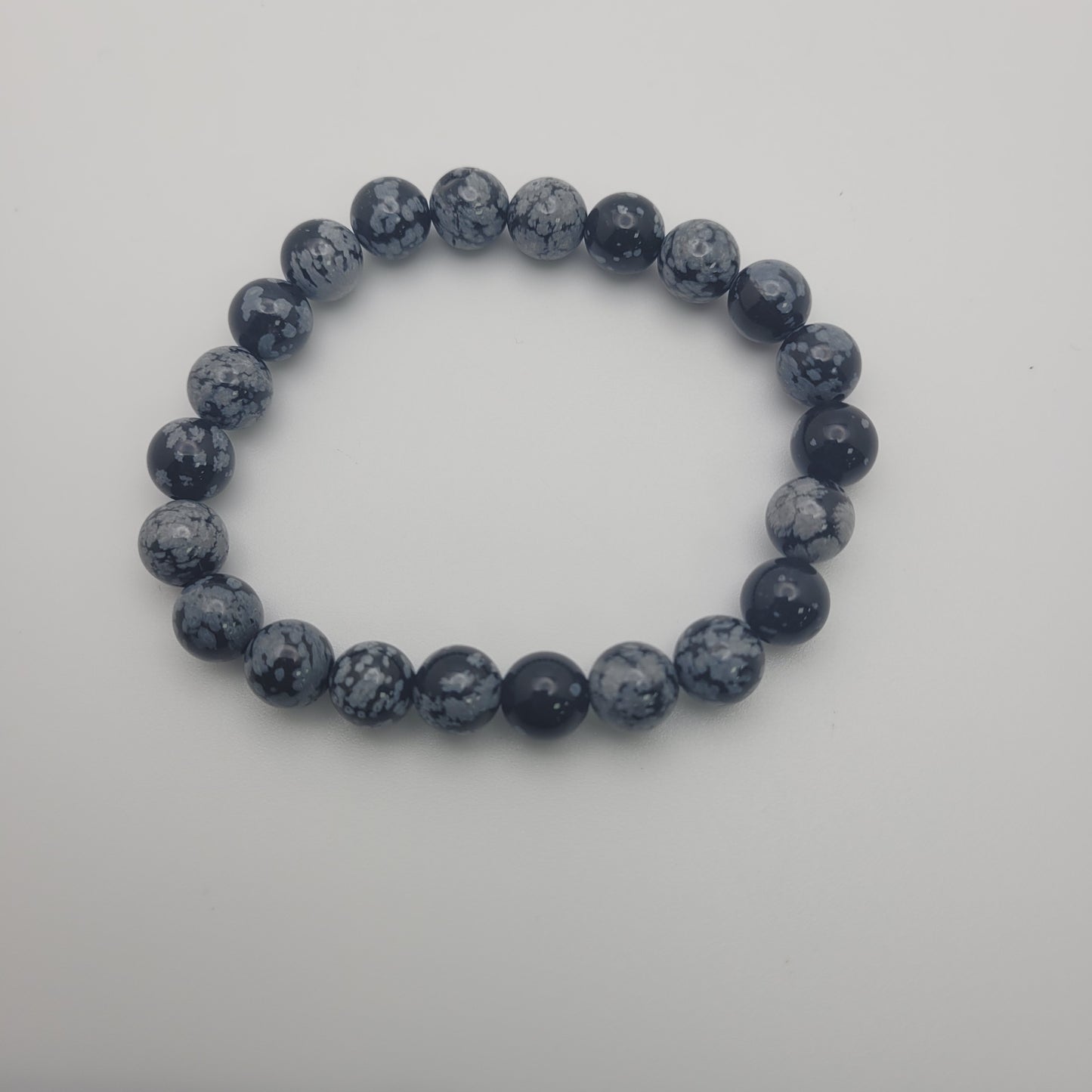 8mm Snowflake Obsidian Round Stretch Bracelet. 